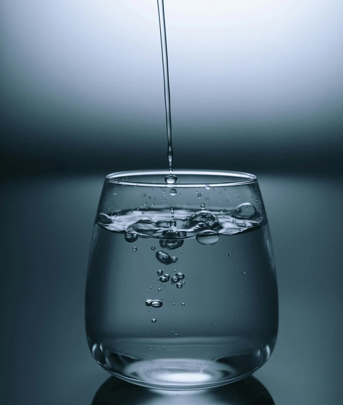 Fresh drinking water poured into a clear glass